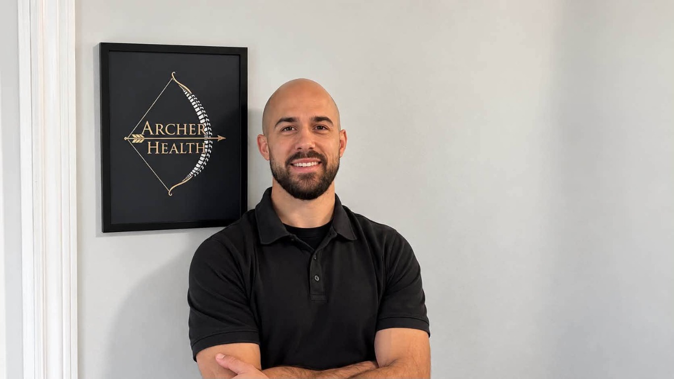 Shelby Murray at Archer Health, with the clinic logo in the background